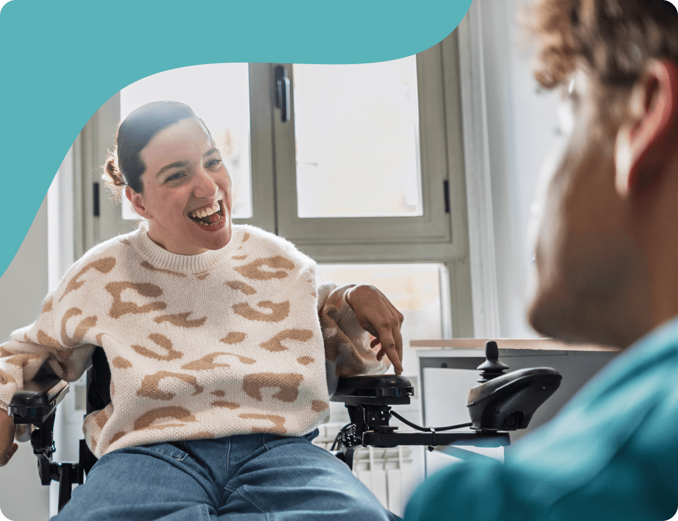 Person using a wheelchair in a bright home setting
