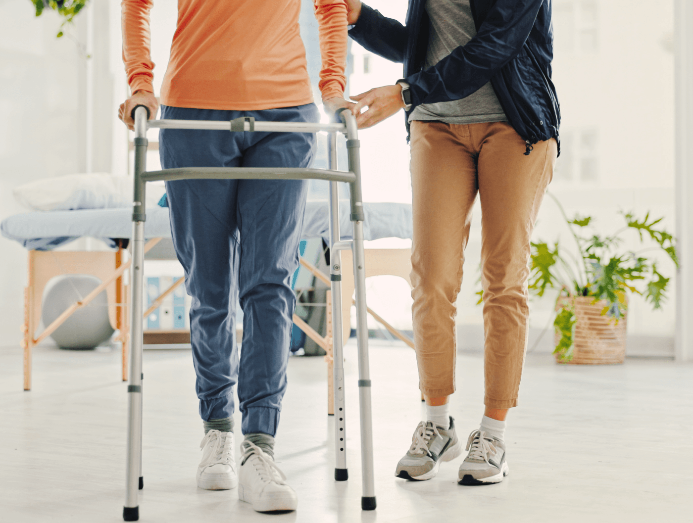 Caregiver assisting a person in a wheelchair at a grocery store