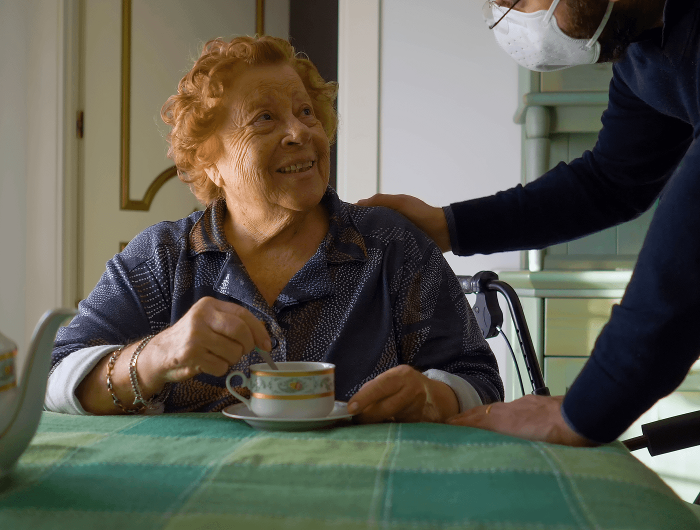 Older adult receiving supportive care at home