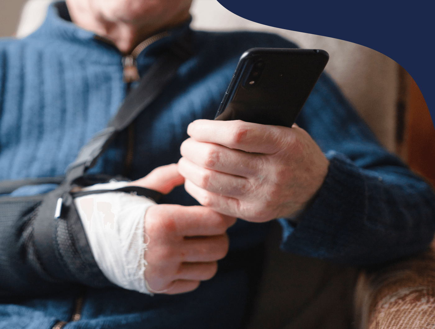 Hands holding a smartphone outdoors