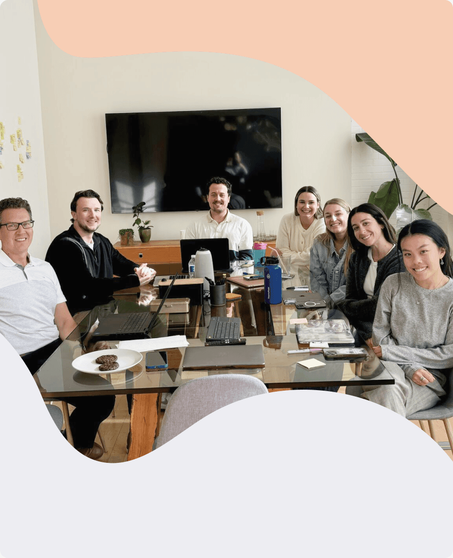 Gotcare team collaborating around a meeting table